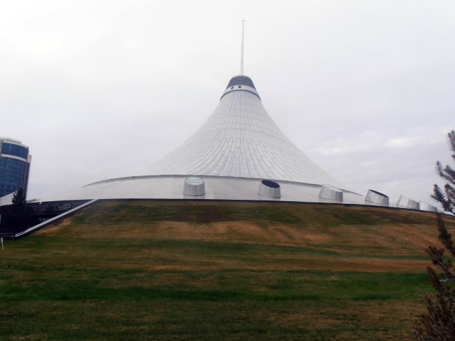 The Khan Shatyr megamall stands tranquilly on the steppe, disguised as a yurt. 