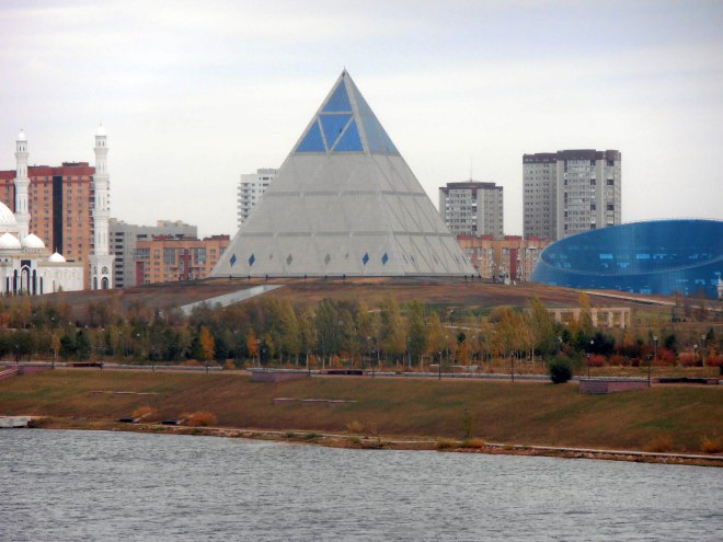 The Palace of Peace and Reconciliation beckons across the river in Astana 